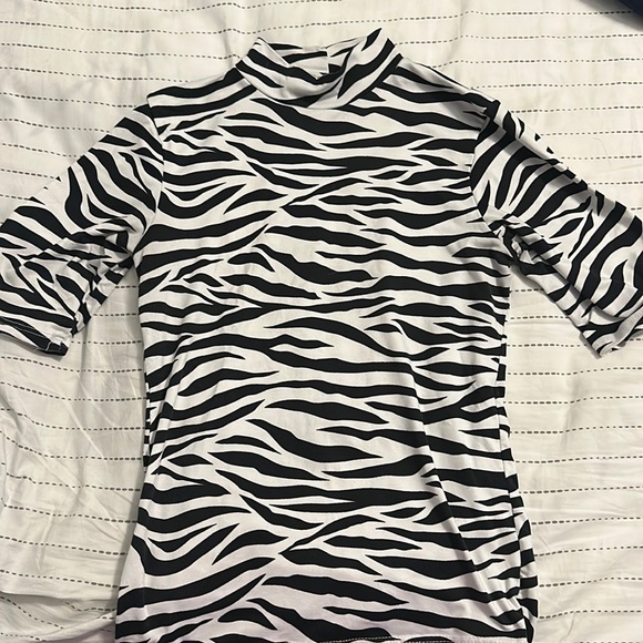 Olivia Rae Tops - Cute Olivia Rae zebra print top 3/4 length sleeves size XS!